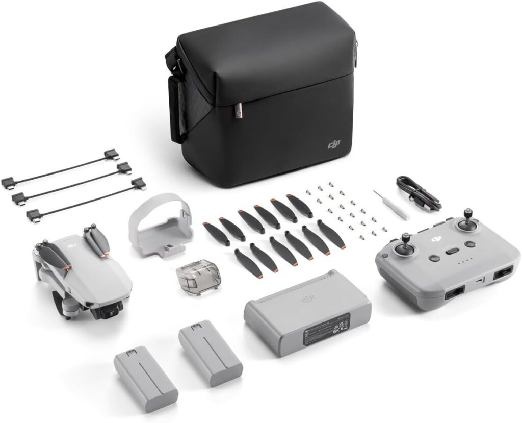 DJI Mini 2 SE Fly More Combo, Mini Drone with 10km Video Transmission, 3 Batteries for 93 Mins Max Flight Time, Under 249 g, QHD Video, Auto Return to Home, QuickShots, Drone with Camera for Beginners