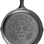 Lodge 10.25 Inch Pre-Seasoned Cast Iron Stamped Skillet – Signature Teardrop Handle – Use in the Oven, on the Stove, on the Grill, or Over a Campfire – Sugar Skull