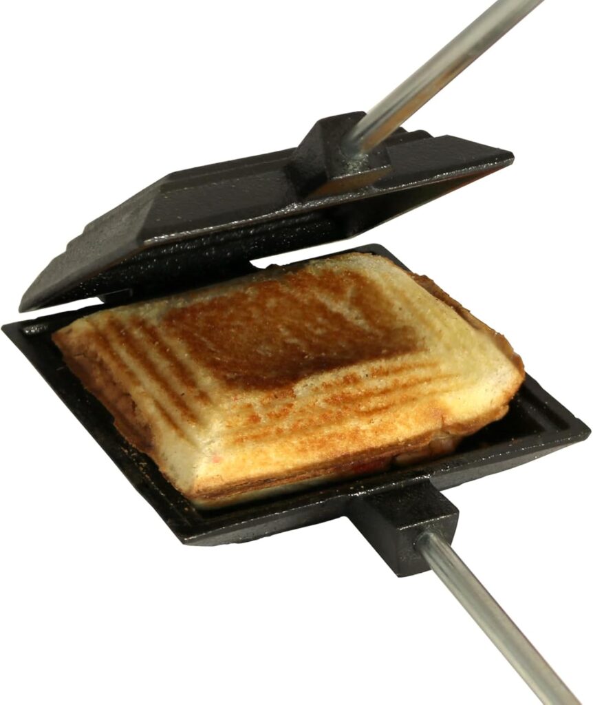 Coghlan’s Cast Iron Camp Cooker – Pre-Seasoned Pie Iron Sandwich Maker with Heat-Resistant, Removable Handles, Easy-to-Clean for Toasted Pies, Grilled Sandwiches, and Meats, For Campfire Cooking