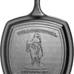 Lodge Pre-Seasoned Yellowstone Stamped Cast Iron Cookware – Signature Teardrop Handle & Assist Handle – Cowboy on Horseback 10.5 Inch Grill Pan