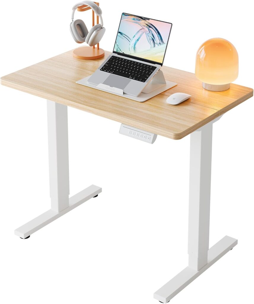 HUANUO 32″ Small Electric Standing Desk Adjustable Height, 4 Memory Height Settings, Sit Stand Up Desk for Home Office & Computer Workstation, LightWalnut